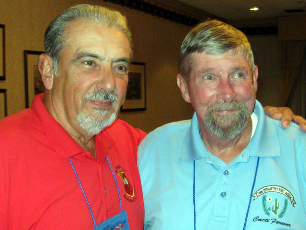 Close Support of the Redlegs
Dennis Dauphin, FO for A/2/35 and Joe Henderson, member of the Tactical Operations Center for the 2/35th Battalion get together at the joint dinner.  Joe is the Executive Vice-President of the 35th Regiment Association.
