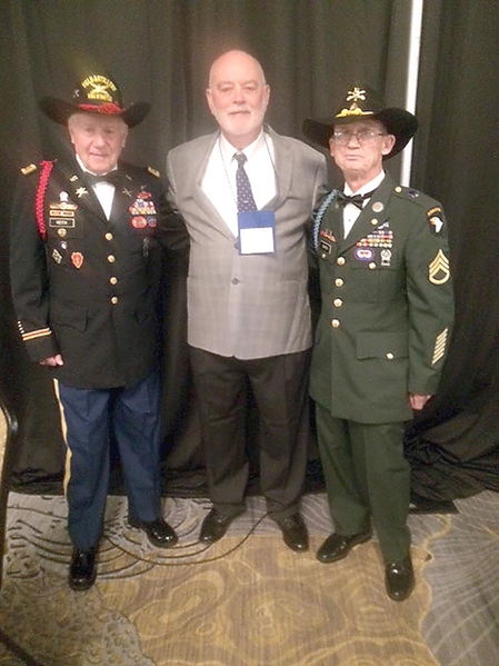 Fancy dress
Dick Arnold poses with two members who really know how to dress for the occasion!!
