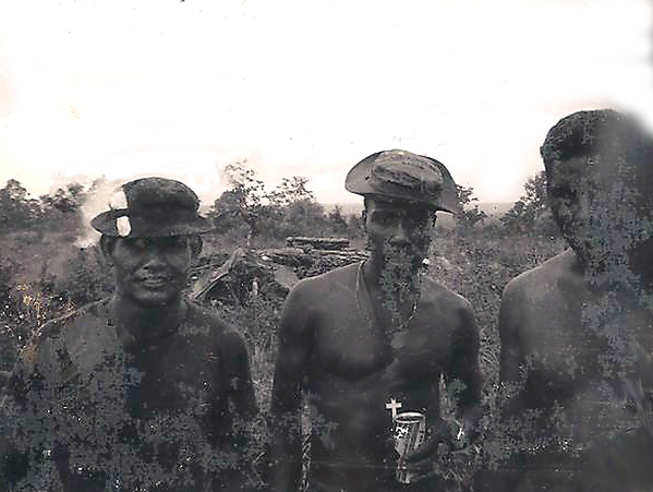 Hip Shoot @ LZ Marianne
LZ Marianne hip shoot 9-69.  (left to right):  "Pineapple", a Section Chief, Sp4 Donald F. Morrell, far right is the Chief of Smoke.  It was Pineapple's tube that had to be dropped when the Chinook was shot up leaving LZ Tuffy.  He was a great photographer and had his VT fuse box with his camera equipment and his photos slung in the ammo net under the hook, which went down. Morrell was with the soul gun crew, I think he became section chief (gun 4?).  Chief was a great guy.  I think he was given a compassionate early return to the World because of his wife.
