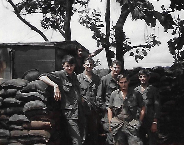 Group pose
This is the Commo Section at LZ Oasis, 1968-69.  L to R: Pedro; Hogan; Hatfield; Hogan; Cox; Perkins; me; Perkins & Hatfield.
