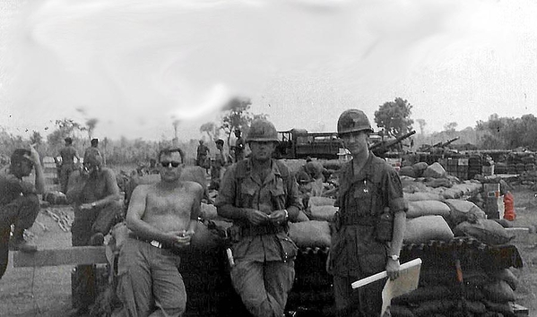 Around the firebase
L to R: Mike Hunnicutt; Jim Walker and Lt Dave Scott
