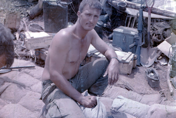 Memory Photo
Water can and canteen cup, M-16, M-1 Shovel, radio-telephone, ammo boxes, knapsack.  Yep...all authentic gear.
