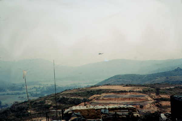 Daily Scene
A helo flies over a firebase somewhere in Nam.
