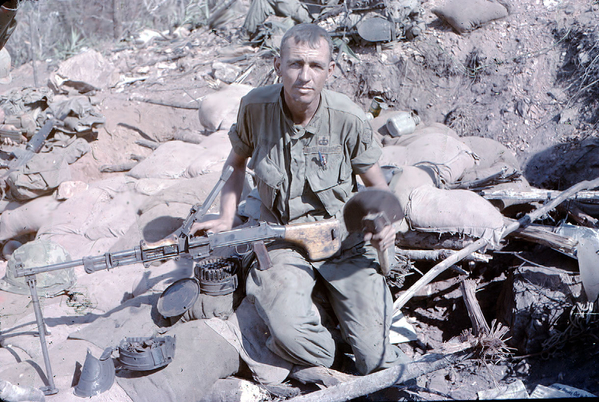 Capt Carter
The guy holding the Chi-com machine gun is Capt Carter, who was the Company Commander of A/1/14.  He was wounded a few days after this photo, and I think sent back to the States.
