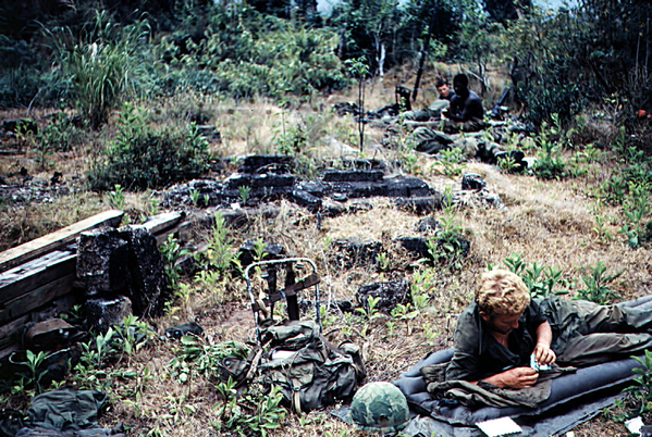 This is the field
Rucksack, helmet, letter from home, and a smoke.
