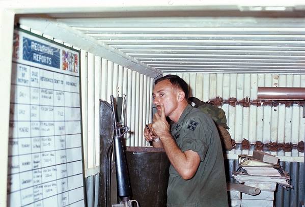 Doing a little trim
Lt Steve Huffstutler, later killed in action during the infamous "Mothers Day" assault at LZ Oasis, May, 1969, trims the mustache...carefully.
