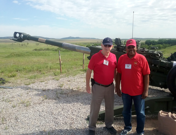 Thursday Firepower Demonstration
Old friends from Nam reunite.  Lt John Cashin and Lt Carlton Epps tour the line of artillery weapons at the Thursday Firepower Demonstration.

Photo courtesy of John Cashin.
