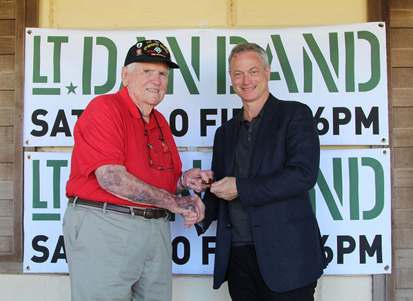 2/9th Coin Presentation
Maj Jerry Orr proudly presents a 2/9th commemorative coin (aka Challenge Coin) to Gary Sinise (Lt Dan's Band).  Gary Sinise is widely known for his support of the military and its veterans.  Gary was at Ft Sill, OK and performed three hours of continuous music at concert. (2016)
