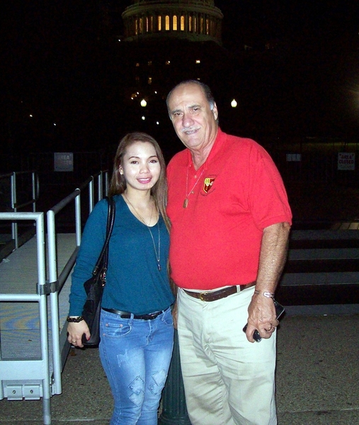 Visiting DC
Newlyweds Merch and Mike Kurtgis stand against the night light of the Capitol.

Photo Courtesy of Joe Henderson
