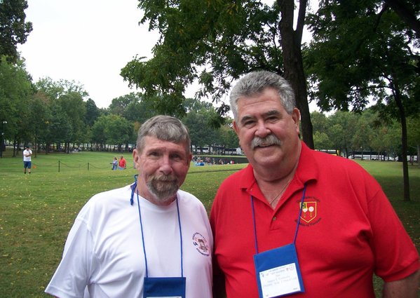 Golf Tournament
Goofers anyone?  Oops....that should read "Golfers, anyone?"  The 35th reunion starts off with an early Friday morning golf tournament at the Greendale Golf Course in Arlington.  The scramble format was used to avoid reporting those embarrassing scores!  Joe Henderson and Jim Connolly pose while hiding their scorecards.

Photo Courtesy of Joe Henderson
