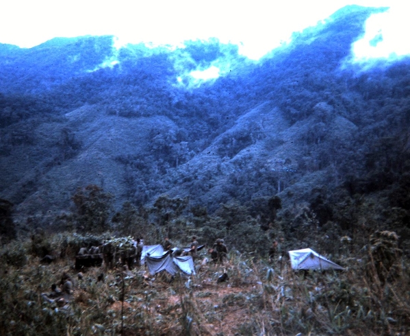 Destroying the caves
View of the survey teams poncho cover sleeping accommodations.  I remember being awaken by something crawling over me that turned out to be large rats. Apparently we didn't police our  empty C-ration cans very well.
