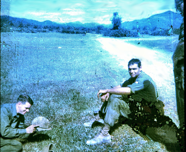 Ban Me Thout
The Survey Crew is again waiting on a ride home.  Surveyor Ziegler is contemplating while Danny Yates takes a break on the road to Ban Me Thout.  Vietnam is a beautiful country.
