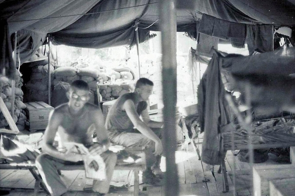 Arrival at LZ Montezuma
Inside our Survey hooch with two UNK artillery surveyors admiring their four-star accommodations.
