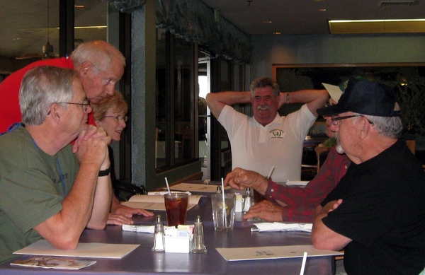 The annual C-1-35 & 2/9th Arty joint luncheon
Joe Turner listens as Don Keith leans in to tell another war story.   Jim Connolly, at the end of the table, has heard all this before.
