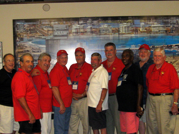 Anyone call for artillery?
Veterans who supported the 35th in the field pose for a photo shoot.  From left, party Host Bert Landau, Webmaster Dennis Dauphin, FDC and FO Party guy Greg Malnar, Ed Moor, FO and pilot Mike Kurtgis, TOC members Joe Henderson, Jim Connolly, and Ernie Correia; Steve Sykora, and Jerry Orr.  Escaping the photo was FO Ed Thomas.
