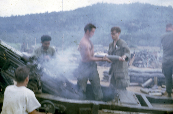 Crew in action
Crew loads another round.

L to R: SP4 Rick Satterfield, PFC Tony Heredia, PFC Mike Steele, PFC Walt Shields
