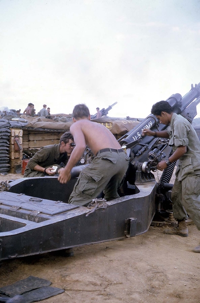 Crew in action
Note that the Gunner has a package of KOOLs in his hand.  Fire extinguisher visible.  Great photo!

L to R: PFC Mike Steele, SP4 Rick Satterfield, and PFC Tony Heredia.
