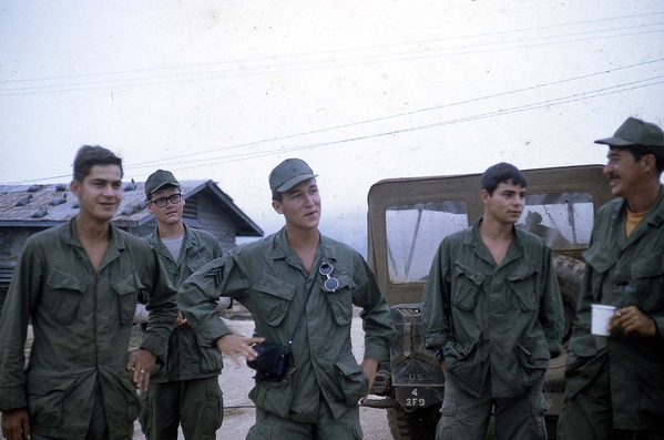 Chat time
Unfortunately, none of these uniforms have a name tag visible.  Anyone know?

Lt Don Blankin does!  L to R: PFC John Trout, next is the medic, SP4 Rick Kelim, UNK, and SSG Keith Portrey.
