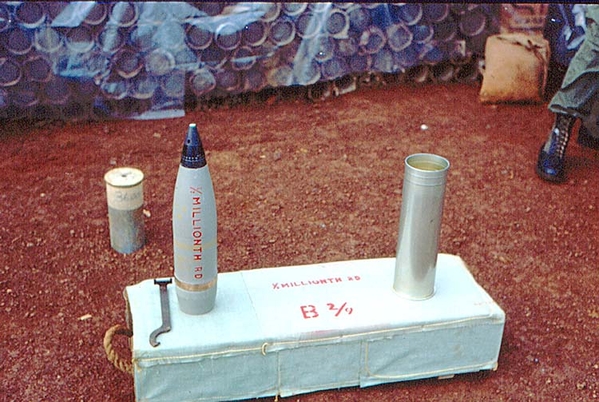 500,000th round
Commemorating the half-millionth round, fired by "B" Battery.  The old fuse setter to the left is a real relic.
