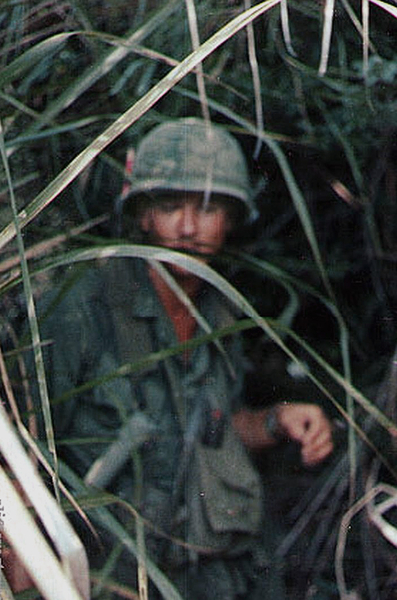 Easy camouflage
FO Lt Wayne Crochet has no trouble blending in with the jungle.

Photo courtesy of Cliff "Westy" Westwood of B/2/35
