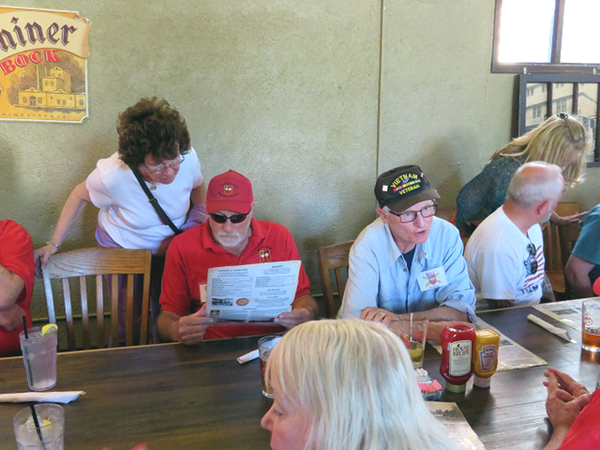 Old Plantation - Thurs Evening Dinner
Rita Stuber looks over Wayne Rayfield's shoulder; Bill Osterhout (guest) and Jeff LaBreck 

Photo courtesy of Barbara Moeller
