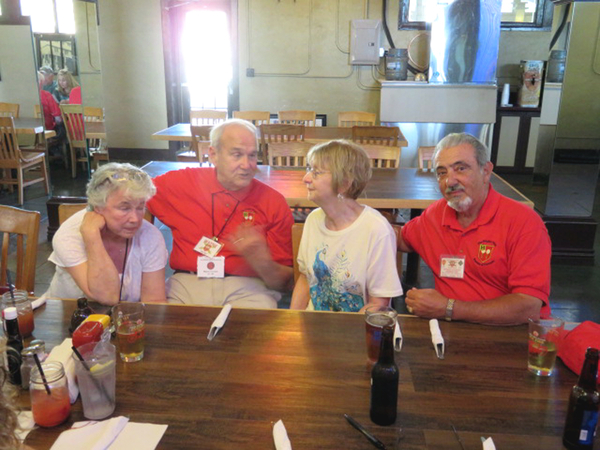 Old Plantation - Thurs Evening Dinner
Dennis says, "Wayne is telling all his war stories again; I think his wife Carol and my wife Jackie have heard them all before from the looks on their faces".

Photo courtesy of Barb Moeller
