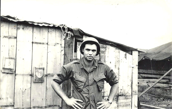 Early construction
This is a reminder to redlegs coming later of how we started out.  Note the 2/9th FA crest on the clapped-together shack behind me.
