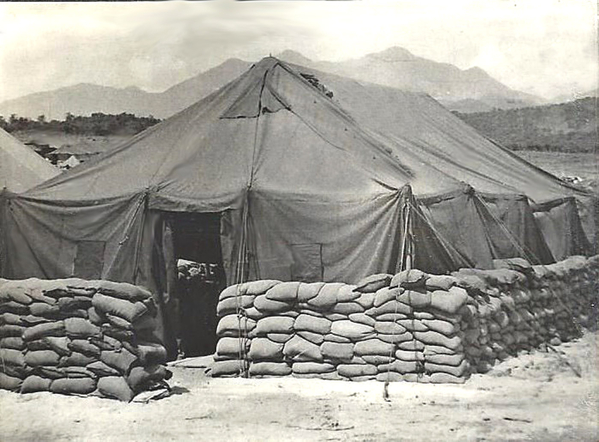 Symbolic sandbags?
Many units did this; a "half-wall" of sandbags.  Some learned that it didn't even provide "half-protection" against a typical mortar attack.
